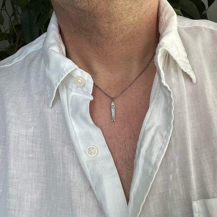 our Silver fish Necklace, Sardine Necklace modelled on a male model.