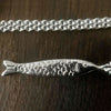 detail of our Silver fish Necklace, Sardine Necklace showing the fish scales.
