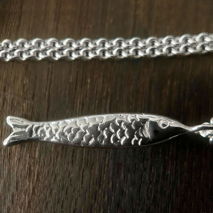 detail of our Silver fish Necklace, Sardine Necklace showing the fish scales.