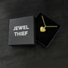 our solid 925 sterling silver heart pendant with a 24k gold vermeil finish in a jewel thief Brighton gift box.