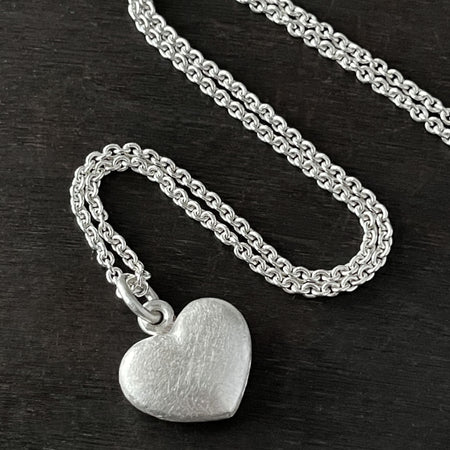 alternative photo of our Solid 925 Sterling Silver three dimensional heart pendant