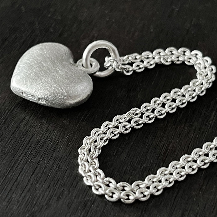 Solid 925 Sterling Silver three dimensional heart pendant with the hallmark on the side of the pendant