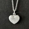 straight on photo of our Solid 925 Sterling Silver three dimensional heart pendant necklace