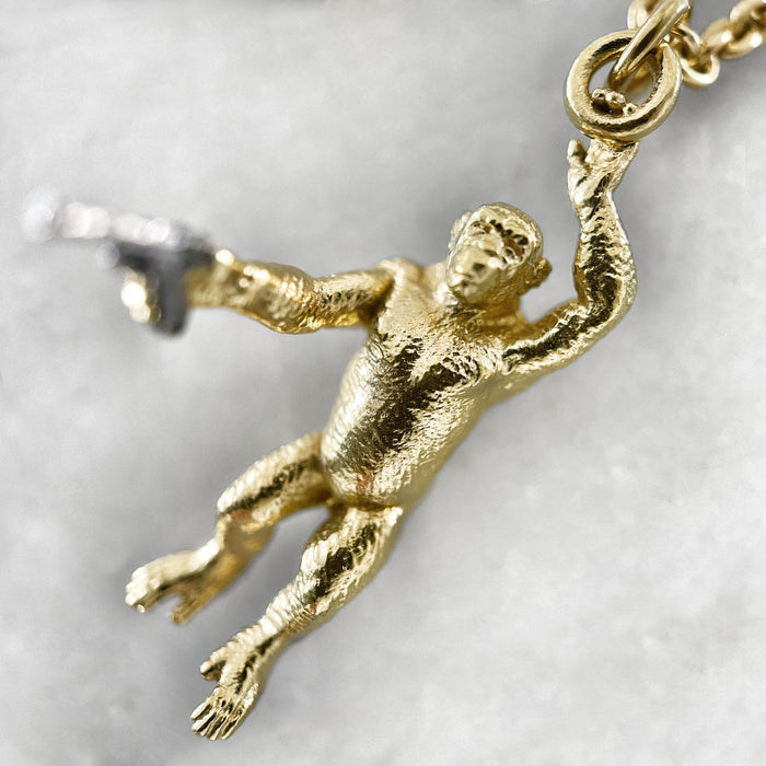 Gold Chimp With A Gun