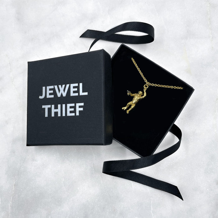 Gold Chimp With A Gun