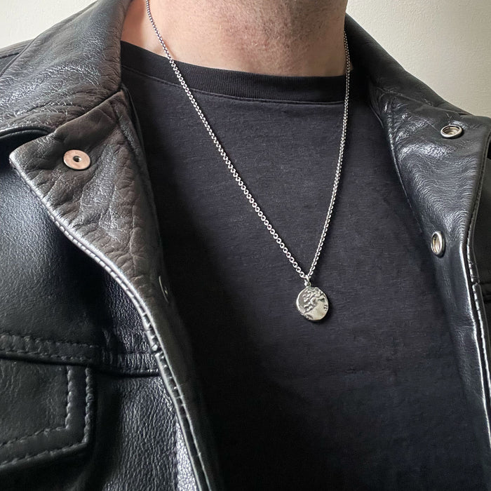 photo of our Alexander the Great Ancient Greek coin pendant necklace by jewel thief Brighton on a male model.