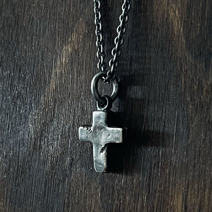 rustic cross pendant  with destressed finish.