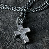 Detail of rustic cross pendant  for men.