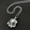 hallmarked side to this double-sided flat skull pendant by jewel thief Brighton.