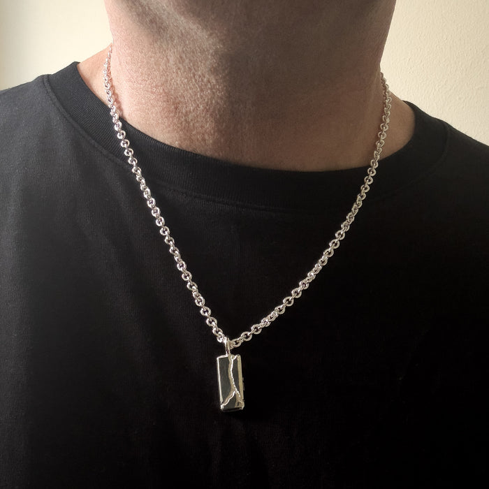 Sandcast Sterling Silver Tag Pendant