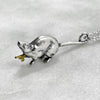 rat pendant  side view