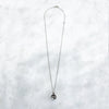 white gold greek octopus coin necklace jewel thief Brighton
