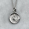 white gold greek octopus coin necklace jewel thief Brighton