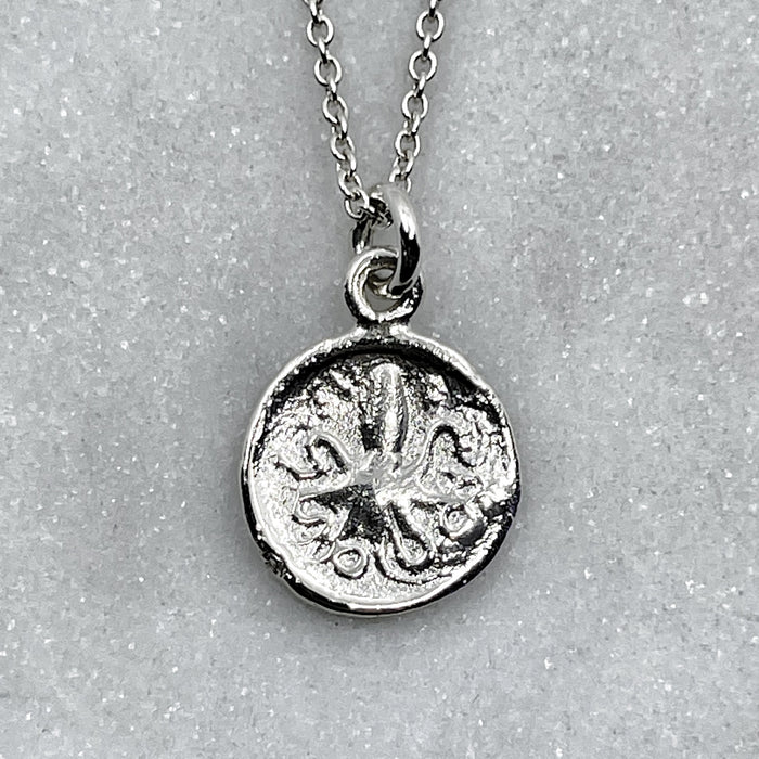 white gold greek octopus coin necklace jewel thief Brighton