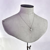white gold greek octopus coin necklace jewel thief Brighton