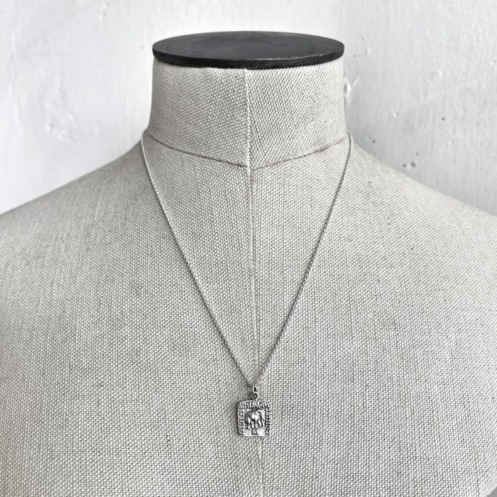 elephant coin pendant necklace jewel thief Brighton