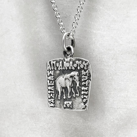 elephant coin pendant necklace jewel thief Brighton