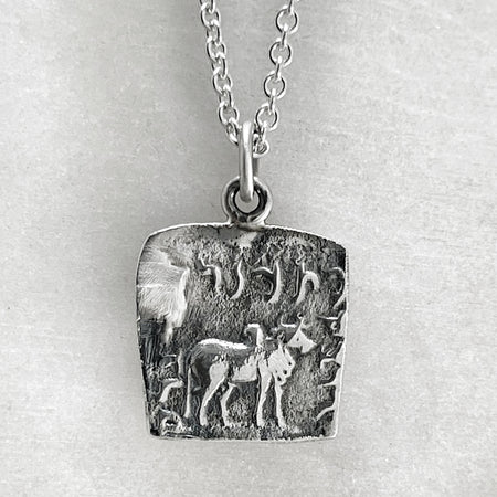 elephant coin pendant necklace jewel thief Brighton