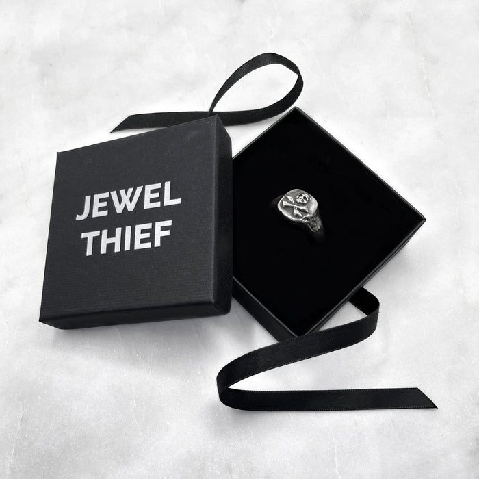 skull and crossbones ring packaging