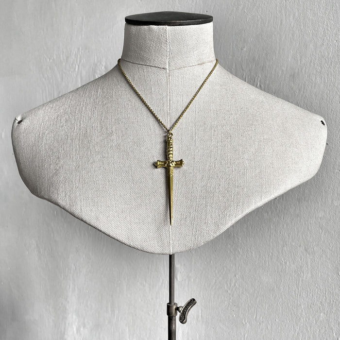 silver gold dagger pendant necklace jewel thief Brighton