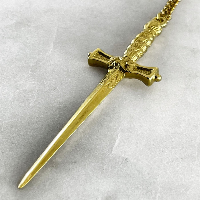 silver gold dagger pendant necklace jewel thief Brighton
