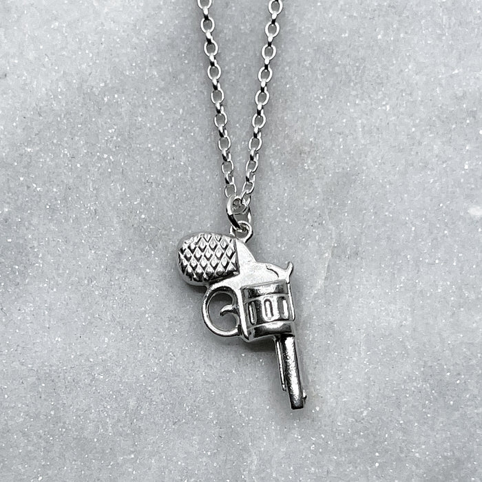 Tiny Silver Revolver Pendant