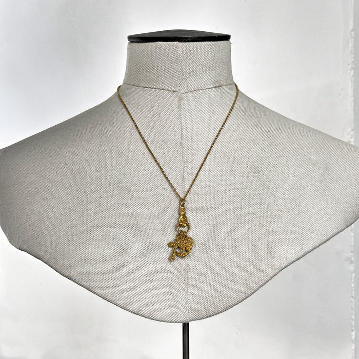 Gold Hand Grasping Cross, Anchor and Heart Necklace